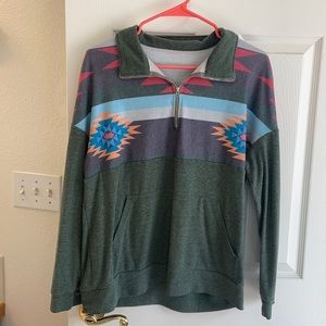 Green light weight sweater with hoodie pocket.